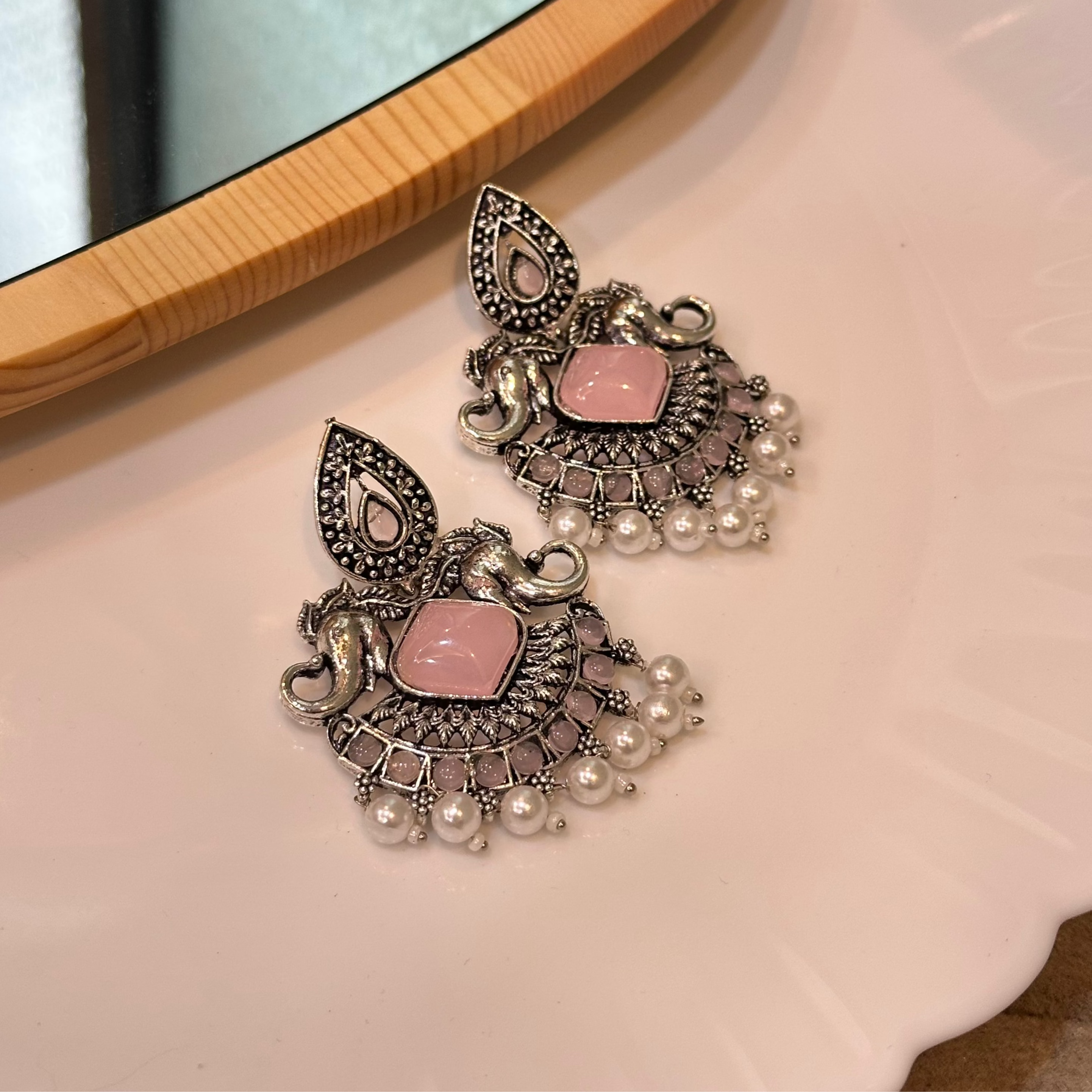 Pink stoned earrings