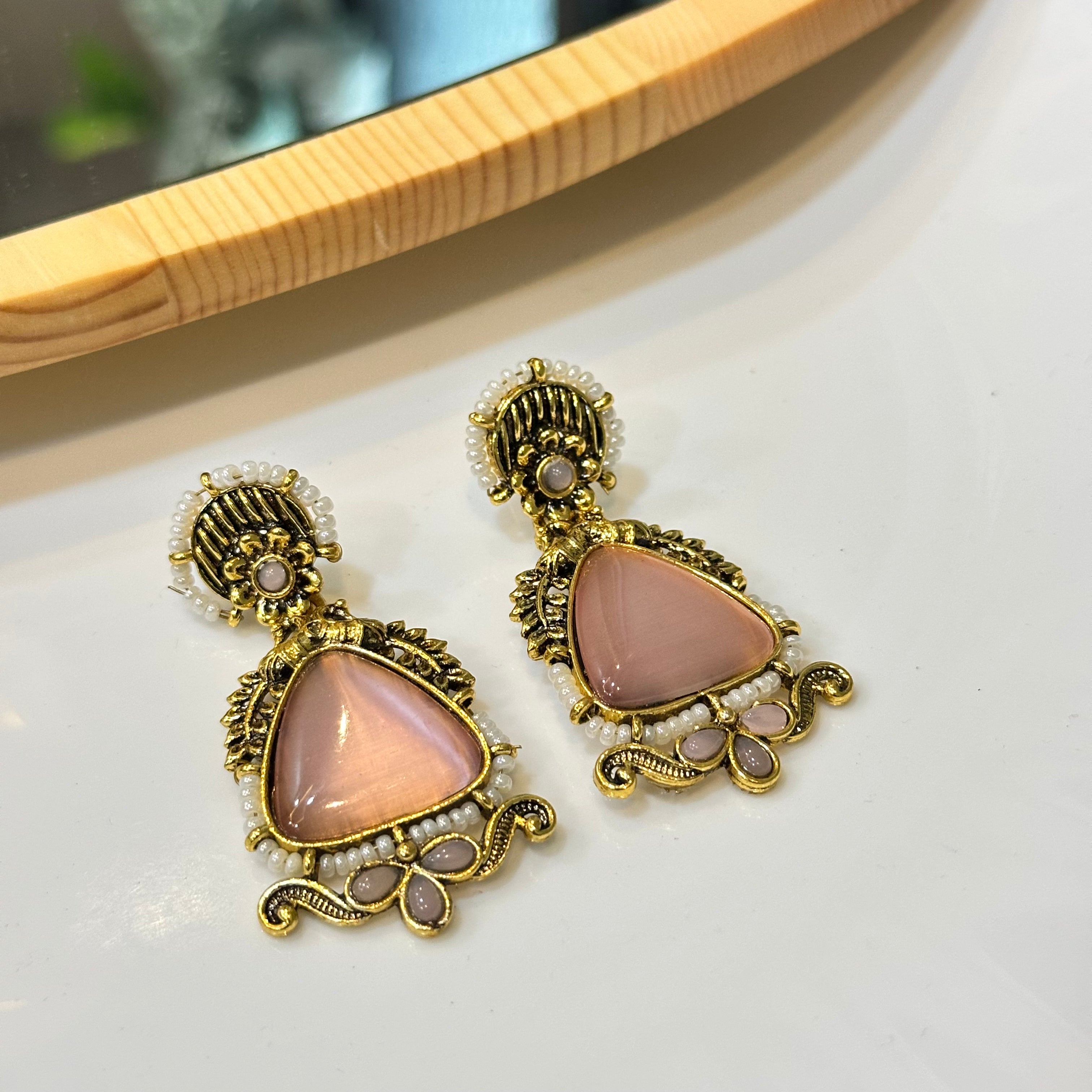 Pink brass earrings