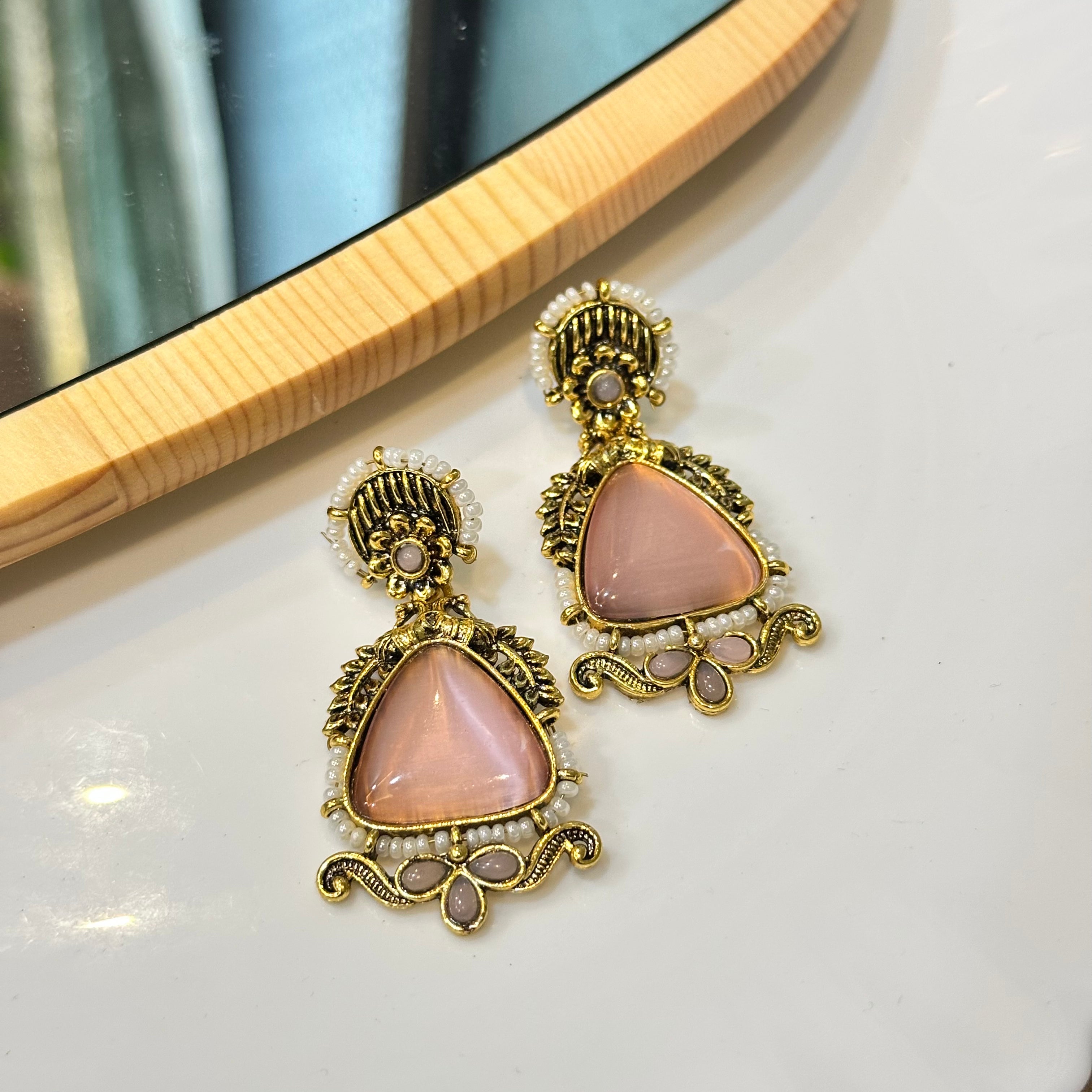 Pink brass earrings