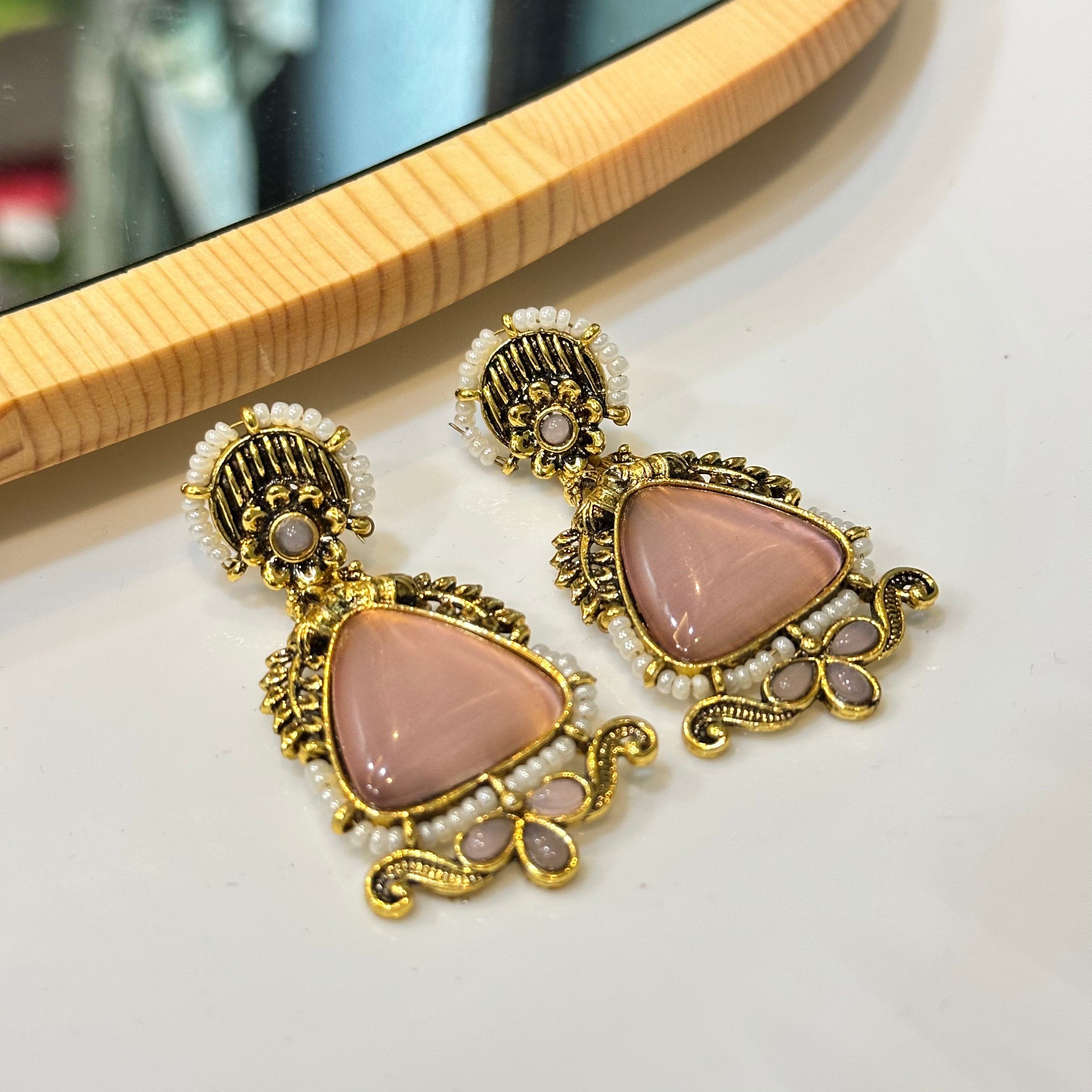 Pink brass earrings
