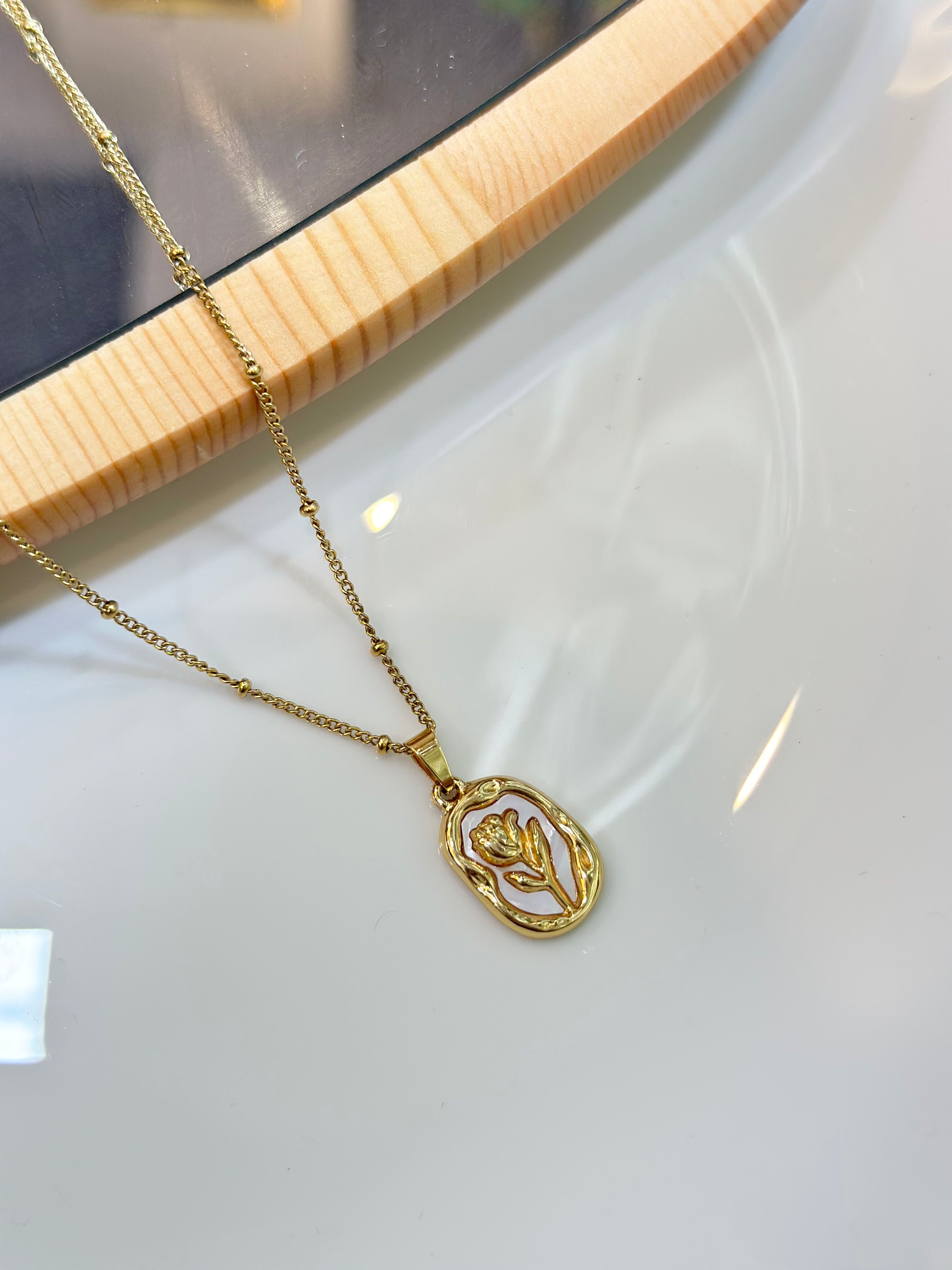 Gold rose necklace